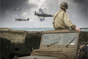 American GI on Normandy beach watches British Spitfire aircraft fly past from his vehicle